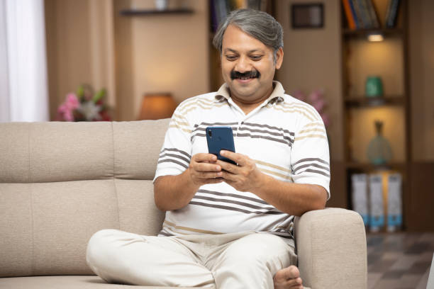 istock Mature man at home - stock phtoo 1298118198