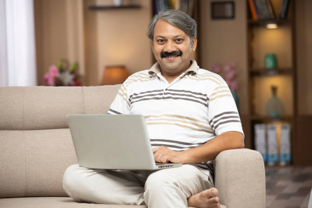 istock Mature man at home - stock phtoo 1298118235
