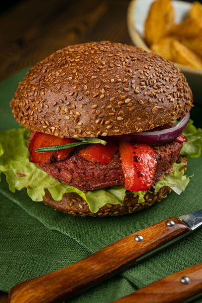 istock Fresh burger with vegan meat and vegetables 1298118341