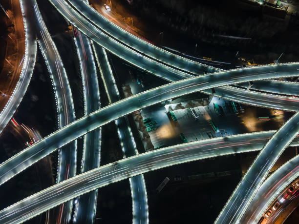 istock Aerial view of overpass at night 1298118385