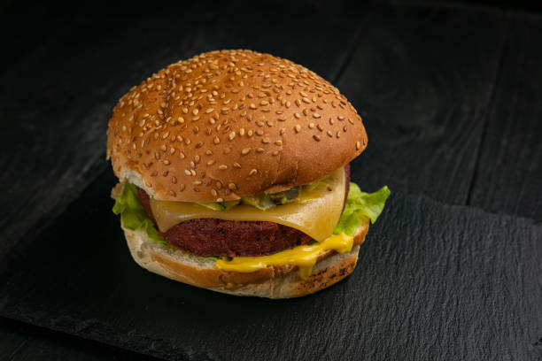 istock Fresh burger with vegan meat and vegetables 1298118532