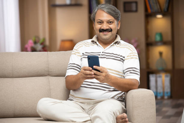 istock Mature man at home - stock phtoo 1298120253