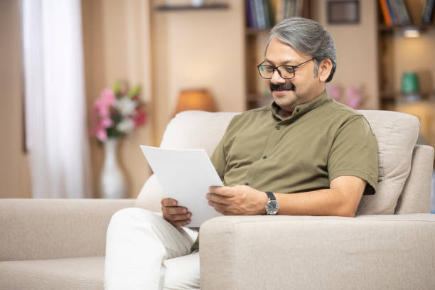 istock Mature man at home - stock phtoo 1298121619