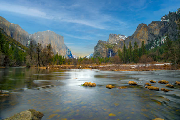 istock beautiful view in Yosemite valley with half dome and el capitan from Merced river 1298121725