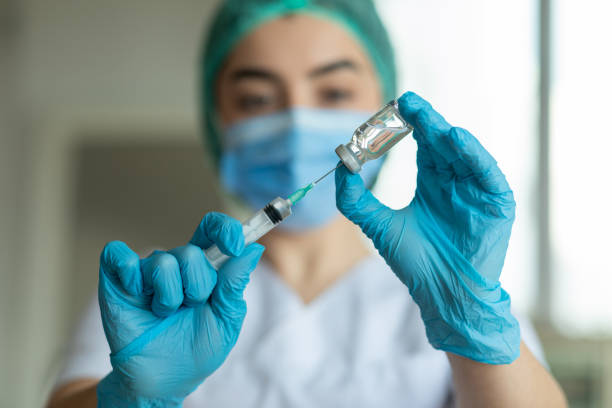 istock Vaccine and syringe injection 1298124073