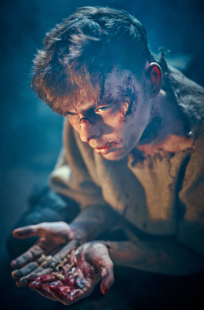 istock Creepy Zombie With Worms In Hands 1298124881