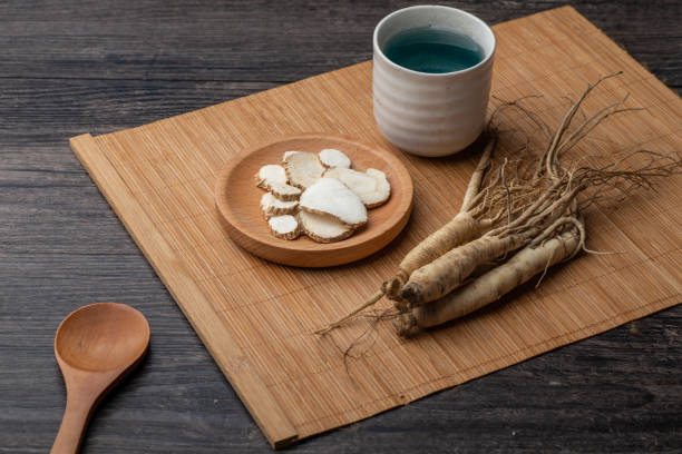 Ginseng, wolfberry and jujube are in the wooden plate Ginseng, wolfberry and jujube are in the wooden plate wolfberry stock pictures, royalty-free photos & images