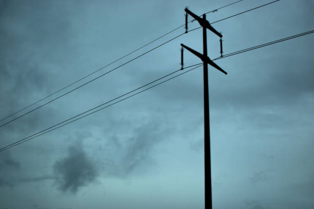istock Power pole and an overcast sky in Switzerland 29.10.2020 1298126568