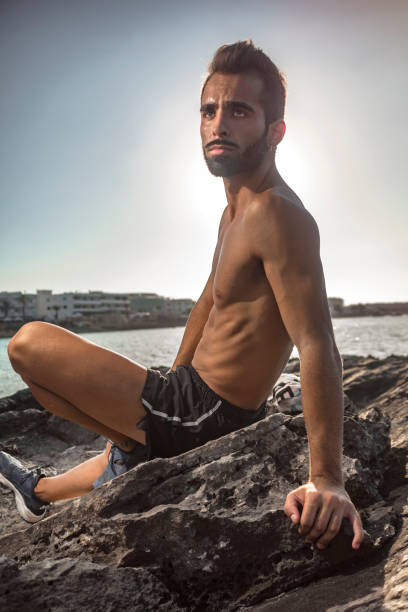 istock Young man doing outdoor fitness. 1298127468