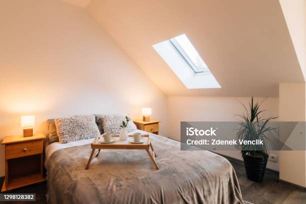 Small Attic Bedroom With Morning Breakfast Service Stock Photo - Download Image Now - Family, Bedroom, Design
