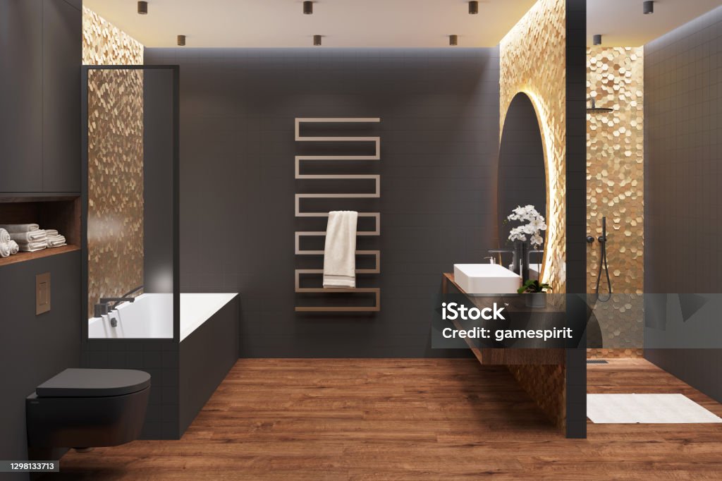 Interior of a black bathroom with a wooden floor with a shower, washbasin, a large mirror on a golden mosaic wall, a towel, a heated towel rail, a bathroom with a partition, a toilet bowl. 3d render Bathroom Stock Photo