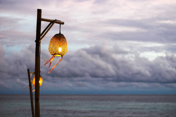 The lamp with sea and sky in the background