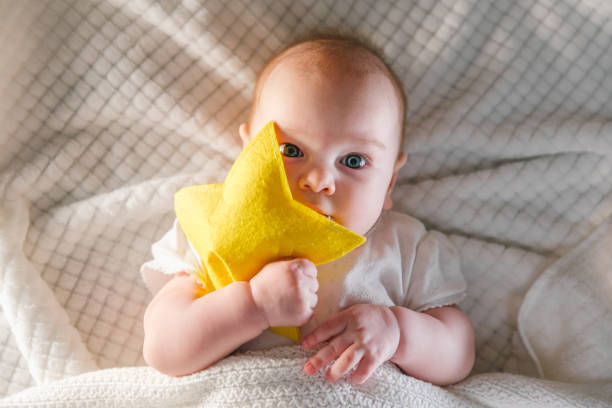 istock The kid is afraid to fall asleep. Nightmares, how to improve baby's sleep 1298136399