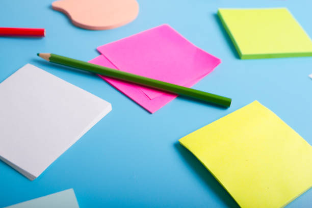istock Reminder notes on the bright colorful paper 1298136503