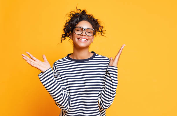 istock Excited ethnic woman in glasses 1298137713