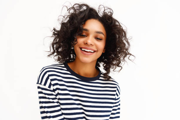 istock Happy ethnic woman with curly hair 1298138082