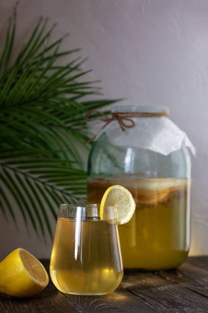 istock Fermented Kombucha drink in a glass glass. Selective focus, place for text. 1298139135