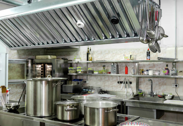 istock restaurant kitchen with dishes and pans without people 1298139593
