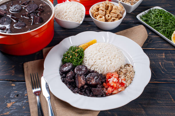 istock Typical Brazilian dish called Feijoada. Made with black beans, pork and sausage 1298140787