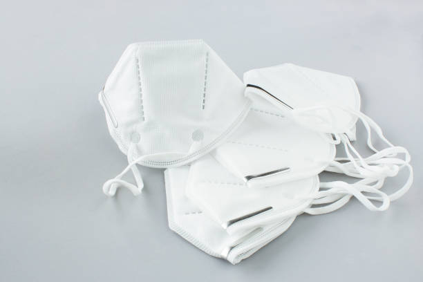 istock bunch of face protection masks 1298145741