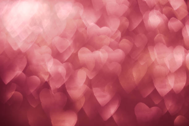 istock heart shaped  bokeh on red background 1298146273