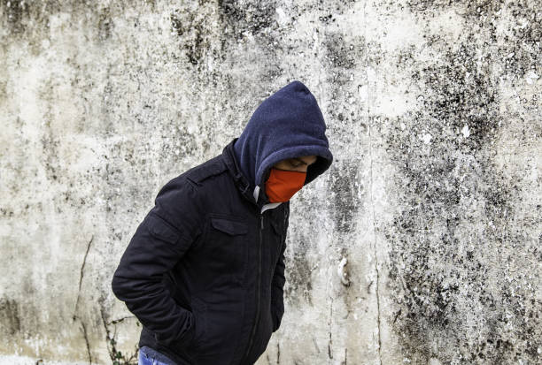 istock Young street gang with mask 1298148319
