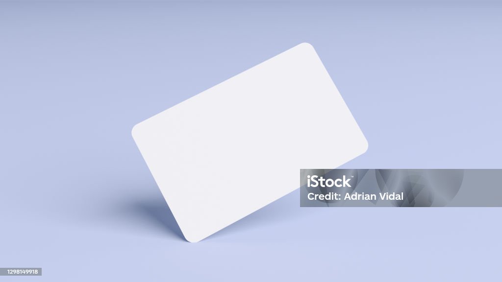 Blank credit card mockup floating over a blue background in 3D rendering. Rounded corners business card mock up for design template Blank credit card mockup floating over a blue background in realistic 3D rendering. Rounded corners business card mock up for design template Credit Card Stock Photo