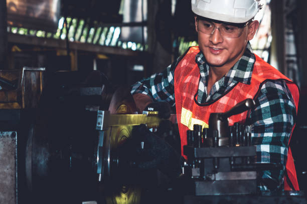 istock Smart factory worker or engineer do machine job in a manufacturing workshop 1298150466