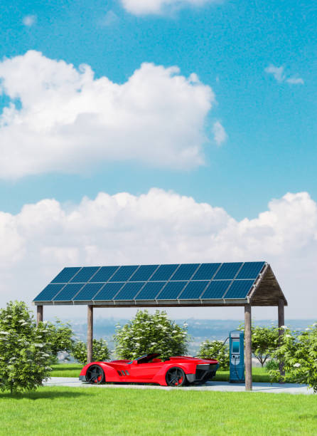 istock Charging electric car with electricity from solar power panels 1298151050