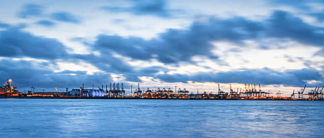 Hamburg harbor at dawn and high tide.