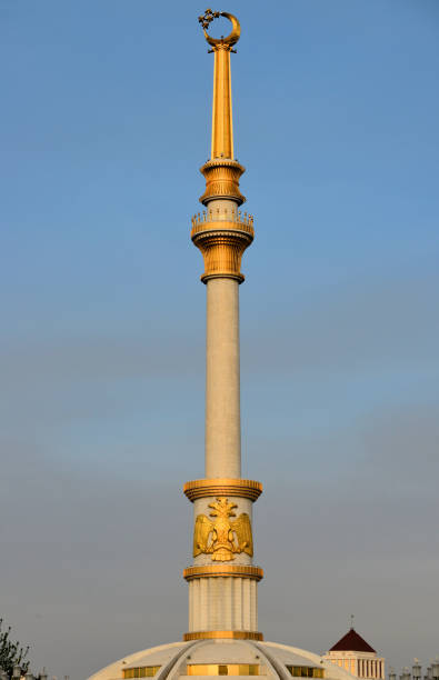 Ashgabat, Turkmenistan: Independence Monument - a 118 meter column topped with a gilded Islamic crescent with five stars - a symbol of the unity of the five largest Turkmen tribes, the lower part of the monument is a hemisphere resembling a traditional Turkmen yurt.