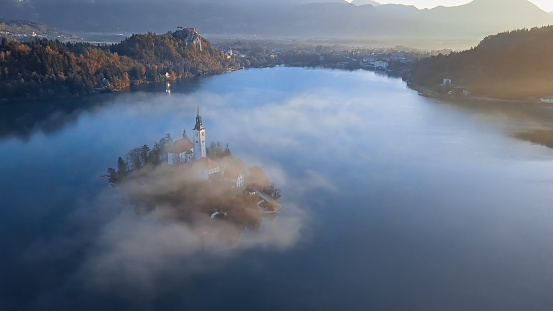 Bled, Slovenia. Morning view of Bled Lake, island and church with Julian Alps in background, Europe