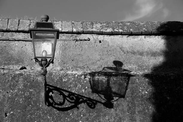 Lamppost with its shadow projected on the wall, Rome, Italy