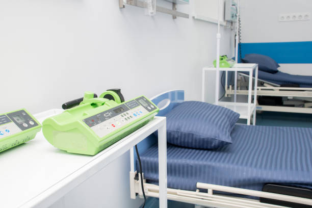 istock Empty modern hospital room for several patients. 1298156672