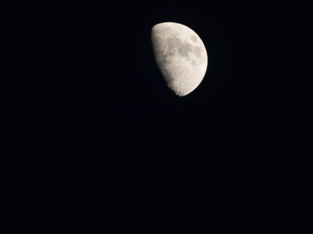 istock a close up of a crescent moon with its craters at night 1298157051