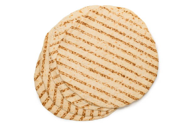 istock Grilled pitta bread isolated on white background. 1298158573