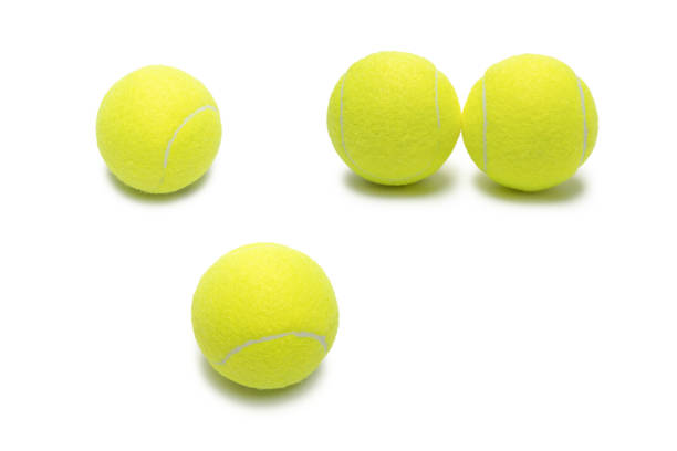 istock Tennis balls isolated on white background. 1298158591