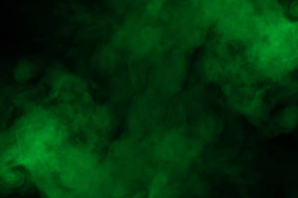 istock Green steam on a black background. 1298158594