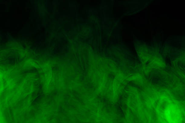 istock Green steam on a black background. 1298158604