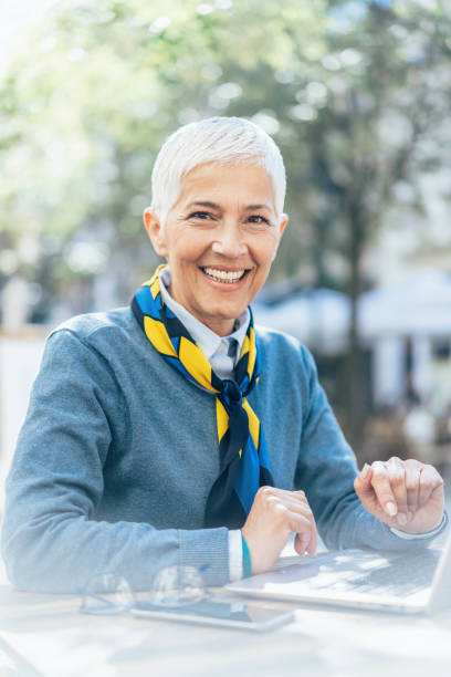 istock Senior woman using laptop 1298159418