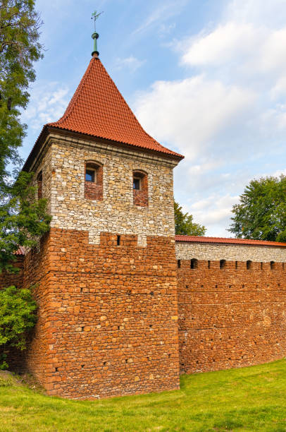 Flanking Tower at the Mint as part of historic city walls of Olkusz old town in Poland Olkusz, Poland - August 24, 2020: Flanking Tower at the Mint as part of historic city walls of Olkusz old town in Beskidy mountain region of Lesser Poland keep fortified tower photos stock pictures, royalty-free photos & images