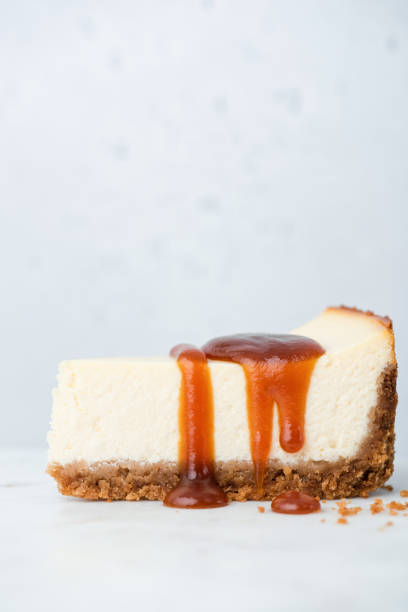 istock Cheesecake with salted caramel sauce 1298159795
