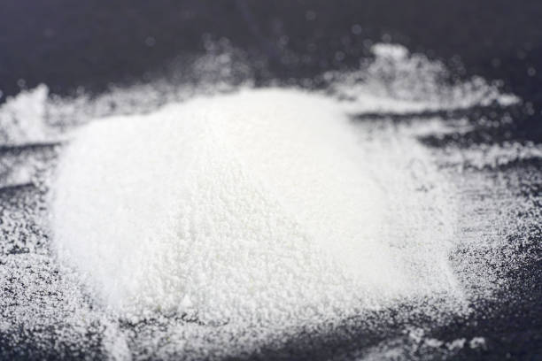 istock Makrogol powder photographed against a black background in the studio 1298160951