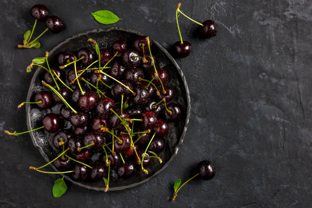 istock Fresh sour cherries in bowl 1298163589