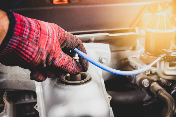istock The mechanic is opening oxygen sensor O2 in the exhaust pipe 1298165192