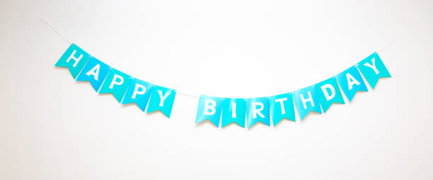 Happy birthday party background with text and colorful tools stock photo