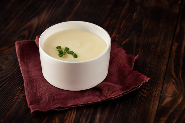 istock Bowl of bechamel sauce 1298166515
