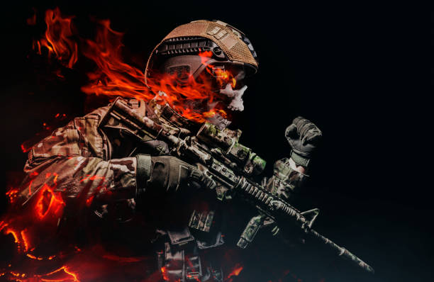 istock Military burning skeleton soldier in armor vest with rifle attacking. 1298167385