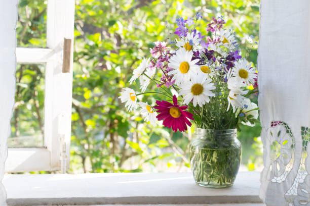 istock Bouquet on windowsill in countryside 1298167622