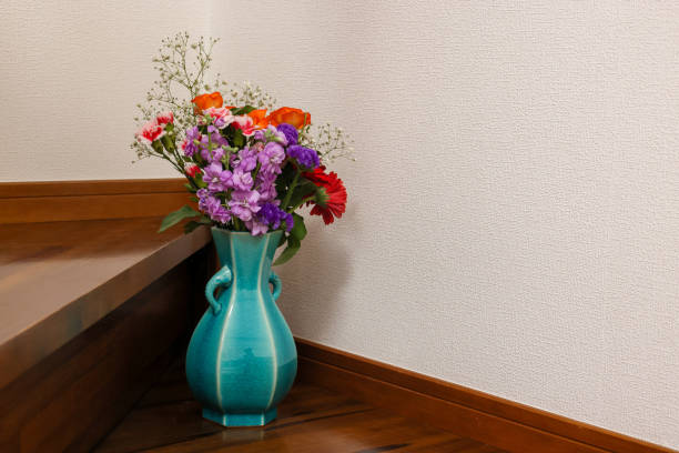 istock various kind of flowers in the blue vase 1298177708